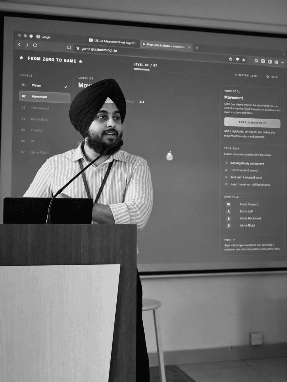 A lecturer in conversation with students in a university lecture hall